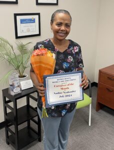 Nadine, our Caregiver of the Month for July 2024.