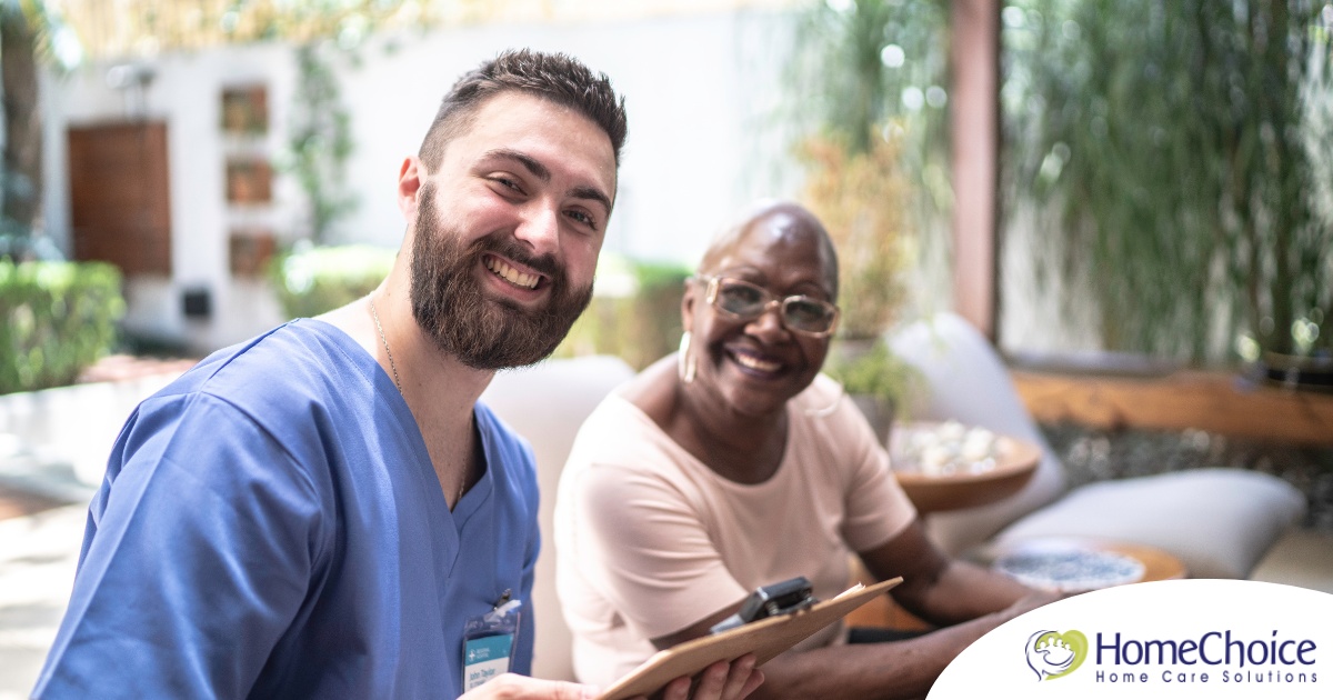 A caregiver and client smile showing that a career as a caregiver can be rewarding.